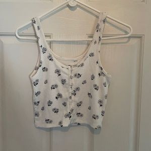 White crop tank top with blue and grey flowers